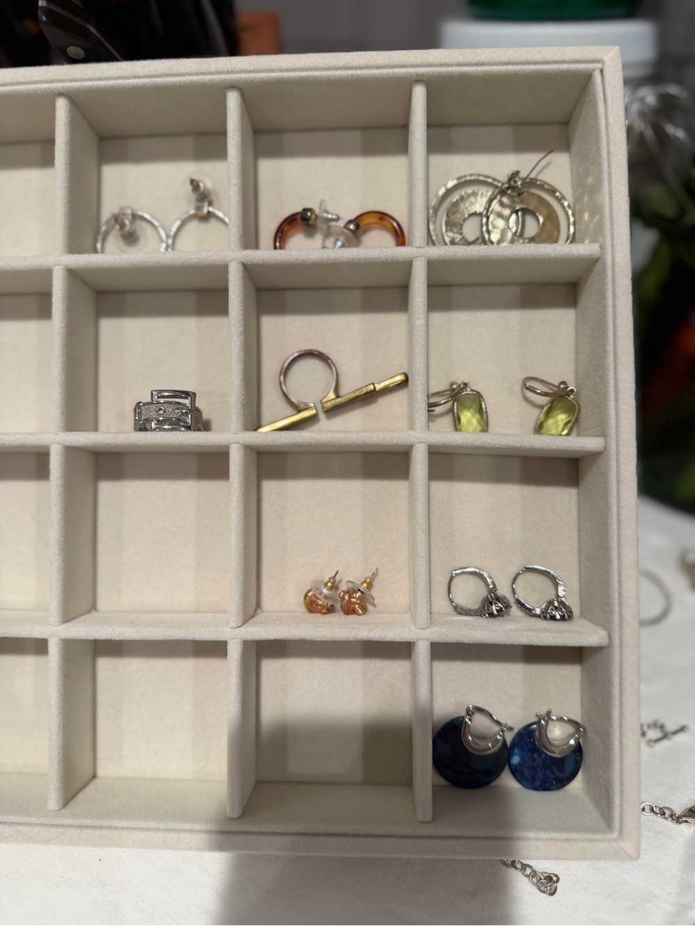 Random lot of rings and earrings — all costume